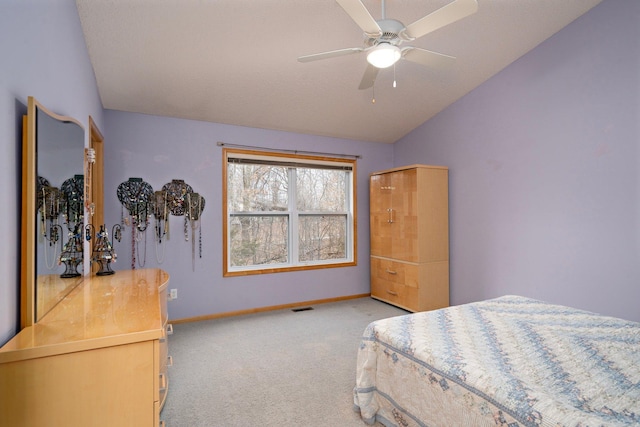 16322 70th Ave N Unit 304, Maple Grove, MN 55311 - bedroom featuring vaulted ceiling, light colored carpet, baseboards, and a ceiling fan