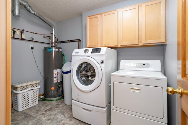 16322 70th Ave N Unit 304, Maple Grove, MN 55311 - washroom featuring gas water heater, washer and clothes dryer, cabinet space, and a textured ceiling