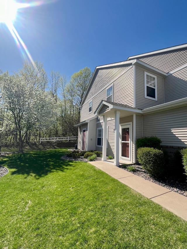16322 70th Ave N Unit 304, Maple Grove, MN 55311 - view of front of property with a front lawn