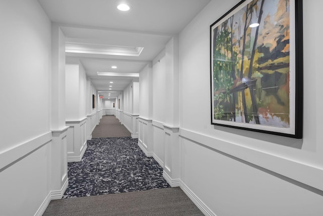 1320 Riverside Ln Unit 112, Mendota Heights, MN 55118 - hallway with dark carpet, recessed lighting, wainscoting, and a decorative wall