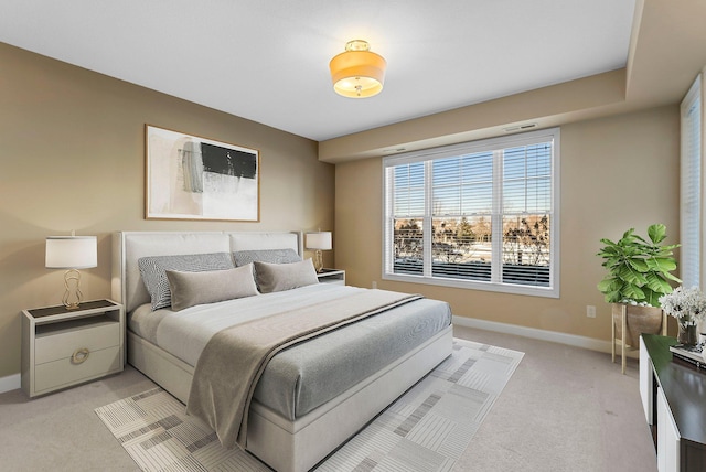 1320 Riverside Ln Unit 112, Mendota Heights, MN 55118 - bedroom featuring light colored carpet and baseboards