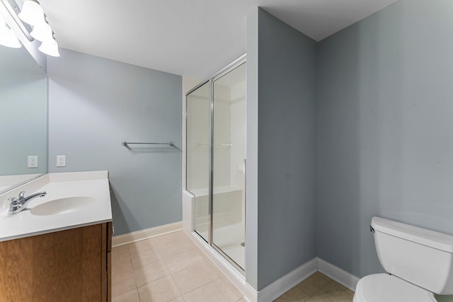 1320 Riverside Ln Unit 112, Mendota Heights, MN 55118 - bathroom featuring vanity, a shower stall, and tile patterned floors