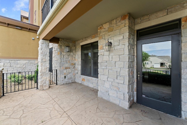 1320 Riverside Ln Unit 112, Mendota Heights, MN 55118 - view of patio with a wall mounted AC