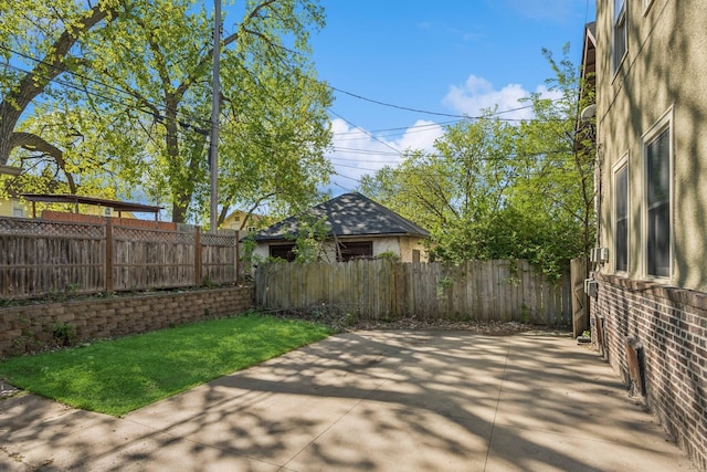 3441 Portland Ave Unit 1, Minneapolis, MN 55407 - fenced backyard with a patio area
