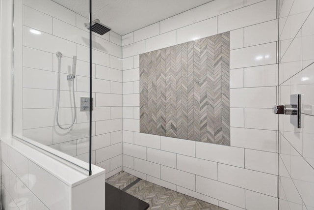 bathroom with a walk in shower