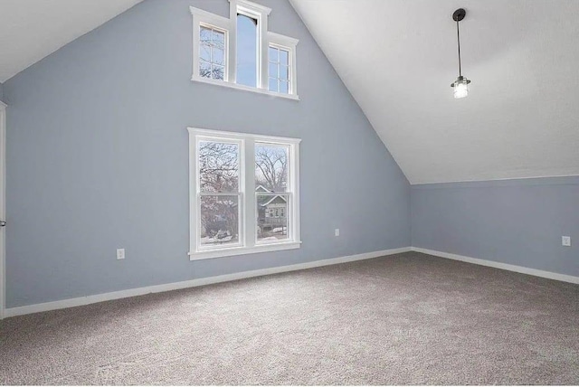 2723 Dupont Ave N, Minneapolis, MN 55411 - additional living space featuring lofted ceiling, carpet, and baseboards