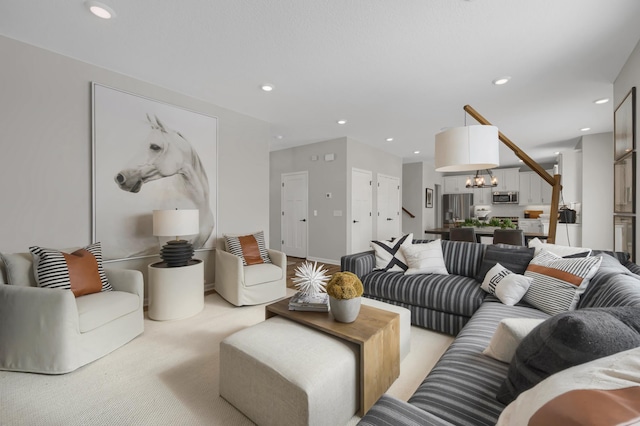 19307 Colonial Trl, Farmington, MN 55024 - living area with a chandelier, light carpet, and recessed lighting