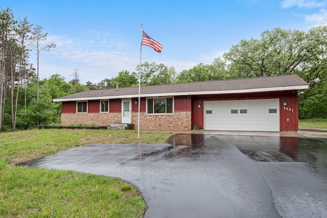 8251 158th Ln NW, Ramsey, MN 55303 - ranch-style home featuring driveway, a garage, brick siding, and board and batten siding