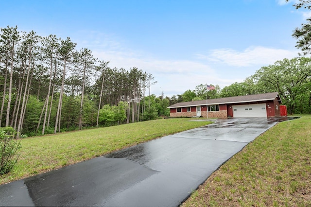 8251 158th Ln NW, Ramsey, MN 55303 - view of front of property featuring driveway, an attached garage, and a front yard