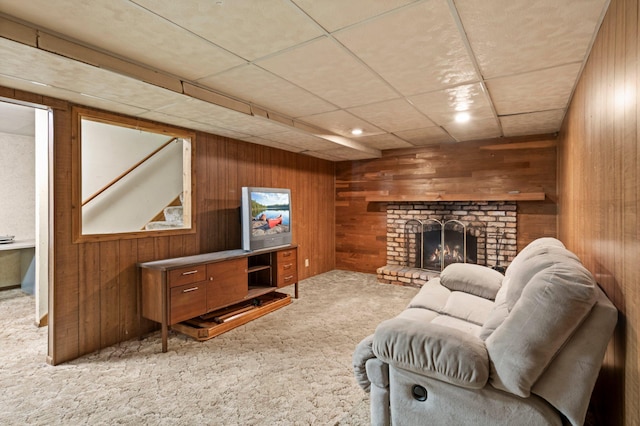8251 158th Ln NW, Ramsey, MN 55303 - living area with light colored carpet, wooden walls, and a brick fireplace