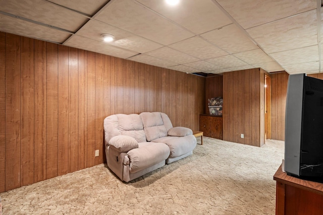 8251 158th Ln NW, Ramsey, MN 55303 - living area featuring carpet, wood walls, and a drop ceiling