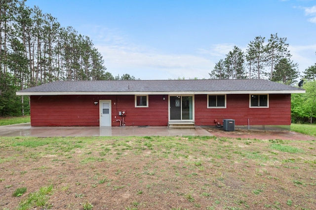 8251 158th Ln NW, Ramsey, MN 55303 - rear view of house with central air condition unit and a patio