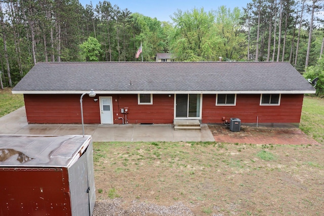 8251 158th Ln NW, Ramsey, MN 55303 - rear view of property with central AC unit, a shingled roof, entry steps, and a patio