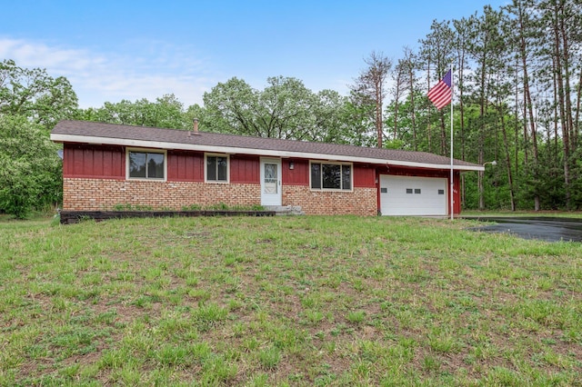 8251 158th Ln NW, Ramsey, MN 55303 - single story home with brick siding, a garage, board and batten siding, and driveway