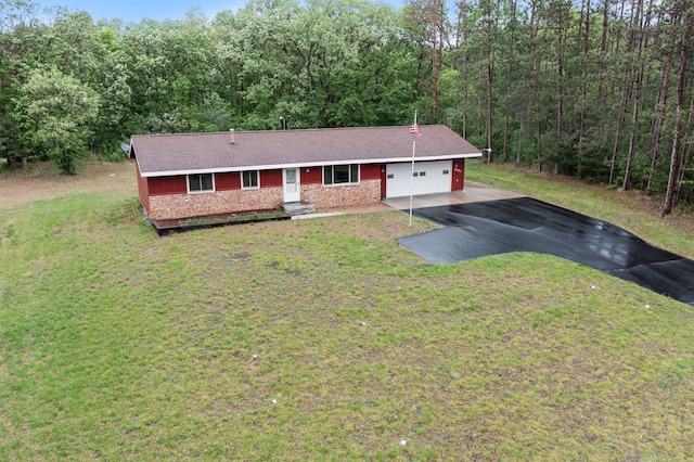 8251 158th Ln NW, Ramsey, MN 55303 - view of front facade with driveway, a front yard, an attached garage, and a view of trees