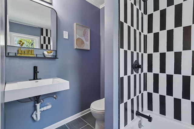 full bath featuring a shower, toilet, tile patterned flooring, and baseboards
