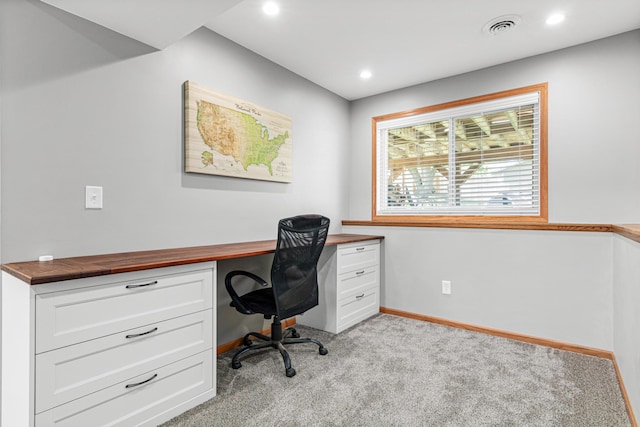 home office featuring light colored carpet, baseboards, and recessed lighting