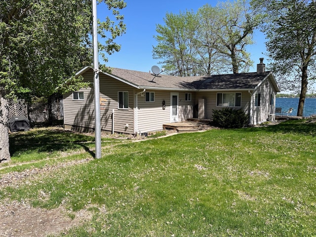 43084 335th Ave, Dora Twp, MN 56528 - rear view of property with a chimney and a lawn
