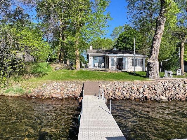43084 335th Ave, Dora Twp, MN 56528 - dock area featuring a yard and a water view