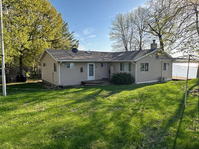 43084 335th Ave, Dora Twp, MN 56528 - rear view of house featuring a chimney and a wooden deck