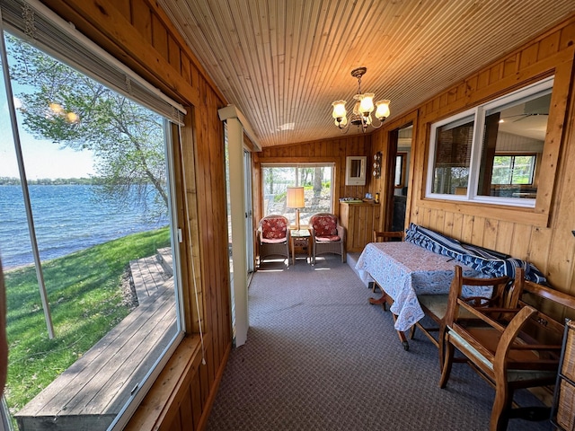 43084 335th Ave, Dora Twp, MN 56528 - sunroom / solarium featuring a water view, a chandelier, and lofted ceiling
