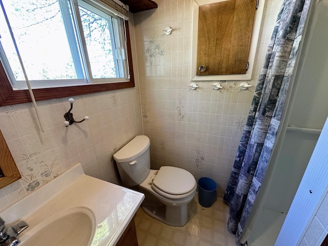 43084 335th Ave, Dora Twp, MN 56528 - bathroom with tile walls, toilet, a shower with curtain, and vanity