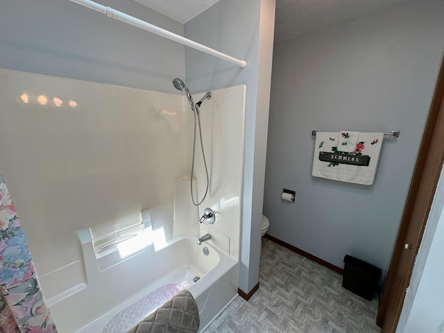 43084 335th Ave, Dora Twp, MN 56528 - bathroom featuring toilet, shower / tub combo with curtain, and baseboards