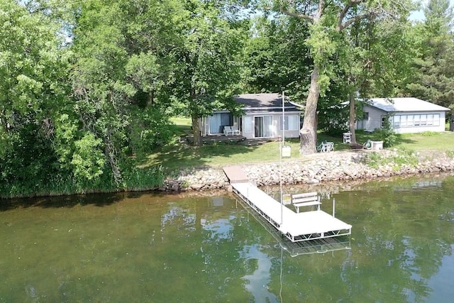 43084 335th Ave, Dora Twp, MN 56528 - dock area with a water view and a lawn