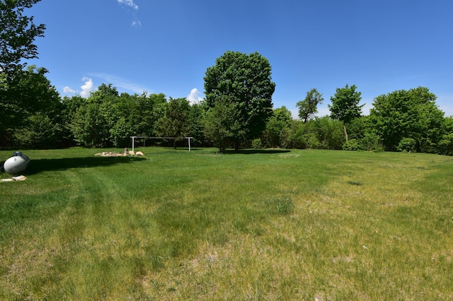 42608 Long Lake Rd, Ottertail, MN 56571 - view of green lawn with a forest view