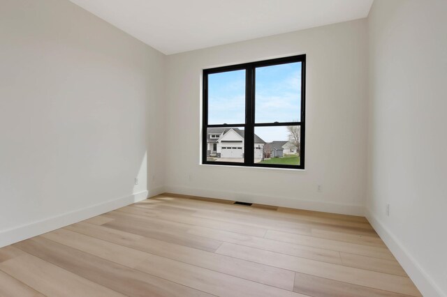 1796 Cobblestone Ct, Hastings, MN 55033 - unfurnished room with light wood finished floors and baseboards