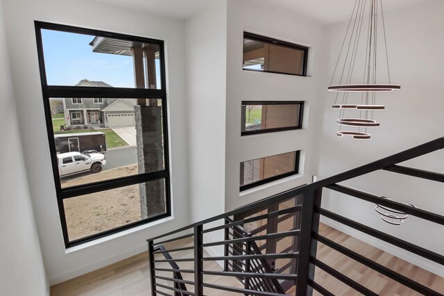 1796 Cobblestone Ct, Hastings, MN 55033 - stairs featuring wood finished floors
