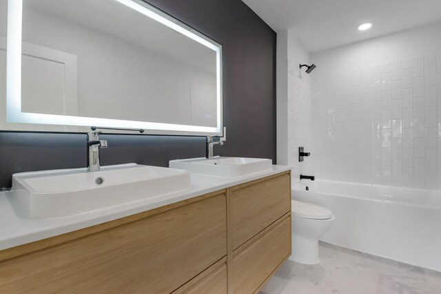 1796 Cobblestone Ct, Hastings, MN 55033 - bathroom featuring toilet, bathing tub / shower combination, double vanity, and recessed lighting