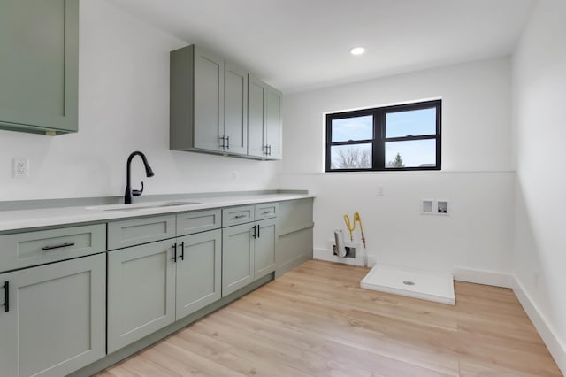 1796 Cobblestone Ct, Hastings, MN 55033 - washroom featuring hookup for a washing machine, cabinet space, light wood-style flooring, recessed lighting, and baseboards