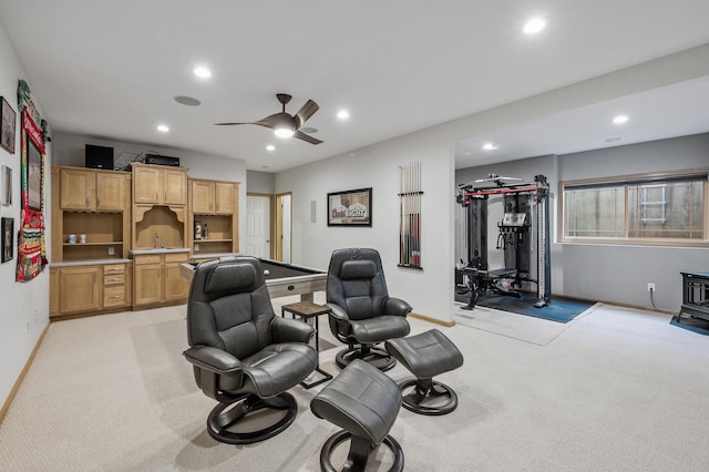 living area featuring recessed lighting, ceiling fan, light colored carpet, and baseboards