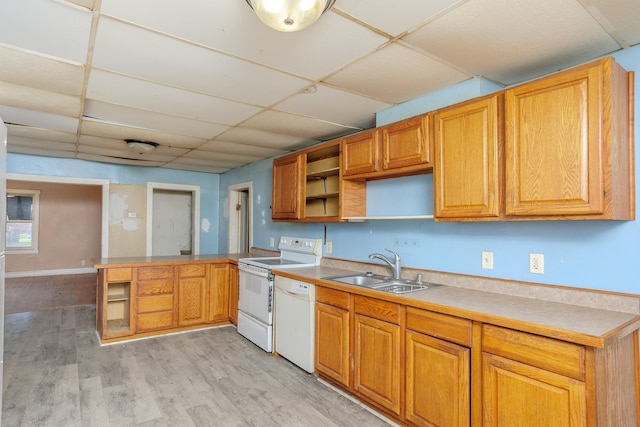 812 Main St, Dodge Center, MN 55927 - kitchen with a sink, a paneled ceiling, white appliances, open shelves, and a peninsula