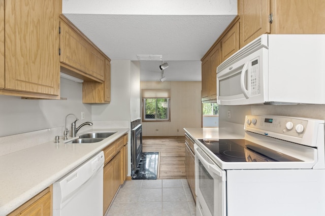 4348 Arden View Ct, Arden Hills, MN 55112 - kitchen with white appliances, a sink, light countertops, light tile patterned flooring, and a textured ceiling