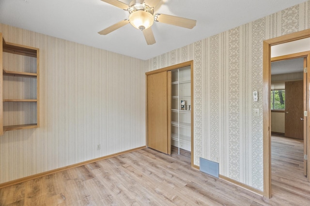 4348 Arden View Ct, Arden Hills, MN 55112 - unfurnished bedroom featuring wood finished floors, a closet, ceiling fan, and baseboards