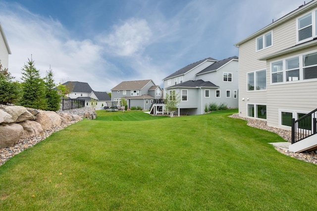 view of yard featuring a residential view