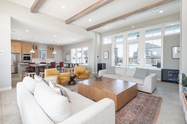 living room featuring beam ceiling, recessed lighting, and baseboards