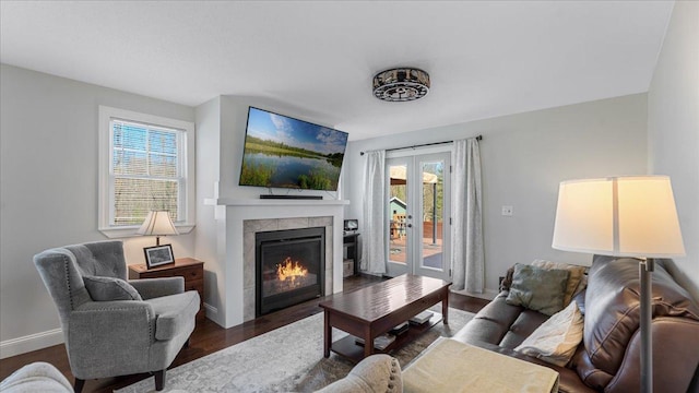 65770 Big Pine Rd, Finlayson, MN 55735 - living area with wood finished floors and a tile fireplace