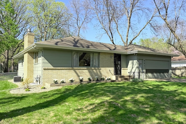 ranch-style home featuring a chimney, brick siding, a garage, and cooling unit