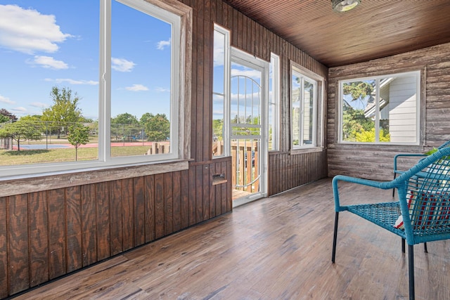 604 Asbury St, Saint Paul, MN 55104 - unfurnished sunroom with wood finished floors