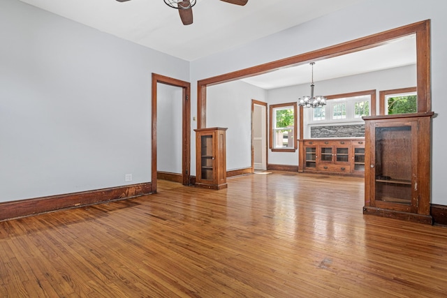 604 Asbury St, Saint Paul, MN 55104 - empty room featuring a ceiling fan, hardwood / wood-style floors, and baseboards