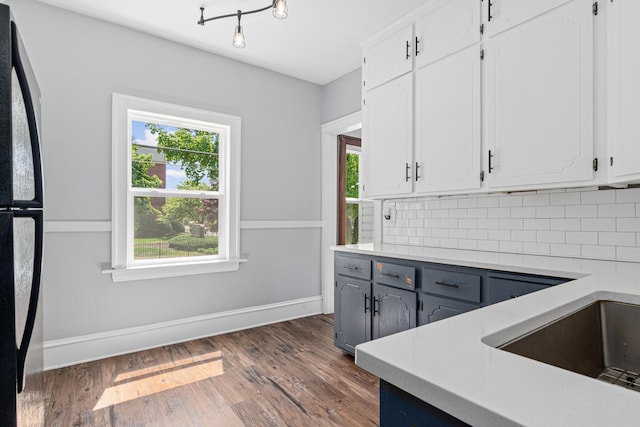 604 Asbury St, Saint Paul, MN 55104 - kitchen with backsplash, white cabinets, dark wood finished floors, and gray cabinets
