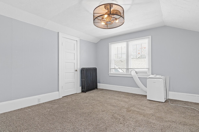 604 Asbury St, Saint Paul, MN 55104 - unfurnished room featuring vaulted ceiling, carpet flooring, radiator, and baseboards