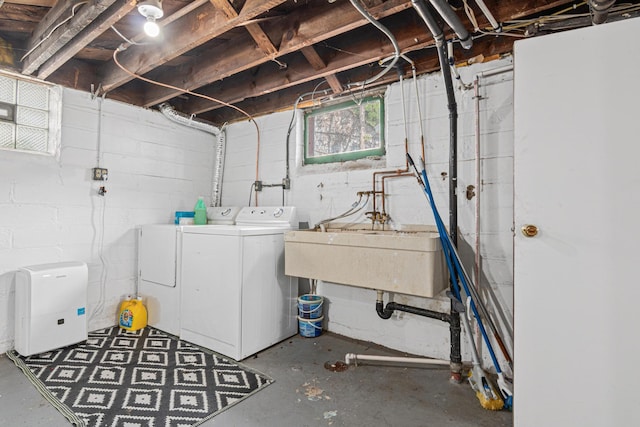 604 Asbury St, Saint Paul, MN 55104 - basement with washing machine and clothes dryer and a sink