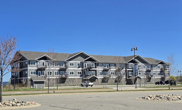715 Lake Shore Dr NE Unit 105, Bemidji, MN 56601 - view of property with a residential view