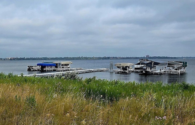 715 Lake Shore Dr NE Unit 105, Bemidji, MN 56601 - dock featuring a water view
