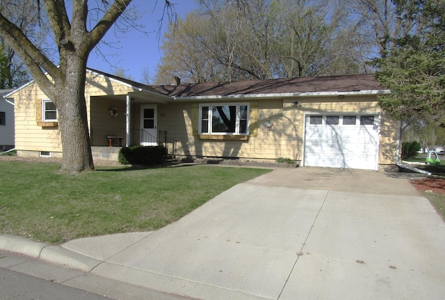 318 3rd St, Dawson, MN 56232 - ranch-style house with a garage, a front lawn, and concrete driveway