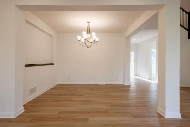 15710 112th Ave N, Dayton, MN 55369 - unfurnished room with a chandelier, light wood-type flooring, baseboards, and recessed lighting
